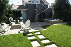 raised-spa-with-fire-pit-and-brick-decking