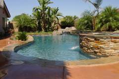 Remodel-1-final-Natural-pool-design-with-raised-wall-sheer-descent-and-rock-waterfall